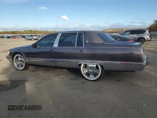✅ 1995 Cadillac Fleetwood • VIN: 1G6DW52P2SR713118 • Лот: 90251155. Опубликован ранее на Copart с пробегом 37 118 миль. Бесплатный доступ к архиву аукционных продаж из США и подробный отчёт об истории автомобиля на DreamBid. Изображение 2.