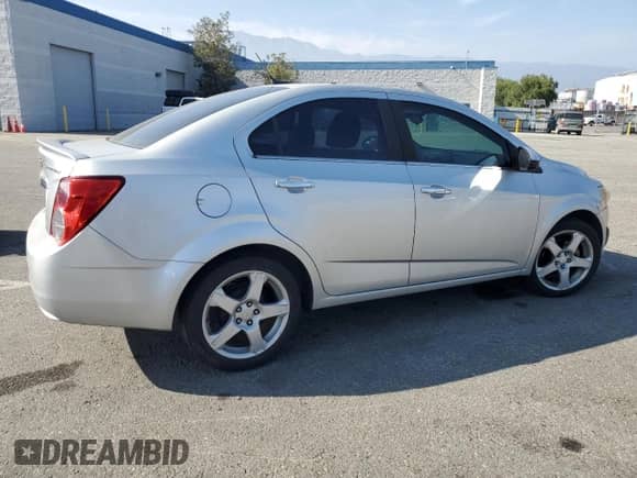 2014 Chevrolet Sonic LTZ с VIN 1G1JE5SG1E4128009, выставлен на аукционе Copart как лот 54007785 с пробегом 146 811 миль миль и Списание • Salvage title. История ставок и продаж доступна на DreamBid. Изображение 3.