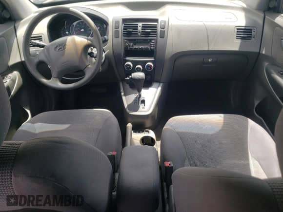 2006 Hyundai Tucson GL z VIN KM8JM12B66U342188, wystawiony jako Copart lot #63140444 z przebiegiem 168 587 mil mil oraz Szkoda całkowita • Salvage title. Historia ofert i sprzedaży dostępna na DreamBid. Obrazek 8.