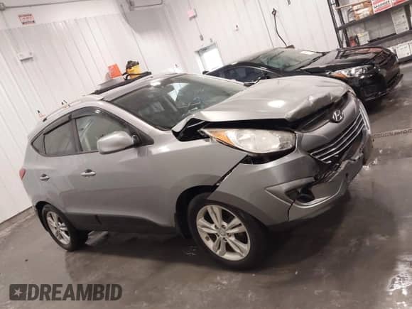 2011 Hyundai Tucson GLS z VIN KM8JU3AC7BU262415, wystawiony jako IAAI lot #43439786 z przebiegiem 88 234 mil mil oraz . Historia ofert i sprzedaży dostępna na DreamBid. Obrazek 13.