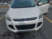 ✅ 2015 Ford Escape Titanium • VIN: 1FMCU9JX9FUC40596 • Lot: 43772085. Wystawiony na IAAI z przebiegiem 155 293 mil. Bezpłatny archiwum sprzedaży aukcyjnych z USA i szczegółowy raport historii pojazdu na DreamBid. Zdjęcie 6.