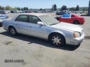 ✅ 2002 Cadillac DeVille • VIN: 1G6KD54Y92U117486 • Lot: 53924295. Listed on Copart with 170,123 mi. Free auction sales archive from the USA and detailed vehicle history report at DreamBid. Image 4.