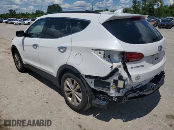 ✅ 2017 Hyundai Santa Fe 2.0T • VIN: 5XYZU3LA7HG390540 • Лот: 63862624. Опубликован ранее на Copart с пробегом 91 602 миль. Бесплатный доступ к архиву аукционных продаж из США и подробный отчёт об истории автомобиля на DreamBid. Изображение 2.