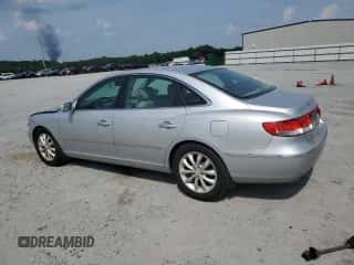 2006 Hyundai Azera SE с VIN KMHFC46F66A133655, выставлен на аукционе Copart как лот 62291215 с пробегом 122 998 миль миль и Списание • Salvage title. История ставок и продаж доступна на DreamBid. Изображение 2.