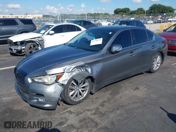 ✅ 2014 Infiniti Q50 Premium • VIN: JN1BV7AP2EM689640 • Лот: 43728976. Опубликован ранее на IAAI с пробегом 97 358 миль. Бесплатный доступ к архиву аукционных продаж из США и подробный отчёт об истории автомобиля на DreamBid. Изображение 17.