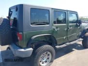 ✅ 2007 Jeep Wrangler Unlimited Sahara • VIN: 1J4GA59157L198095 • Lot: 43011519. Listed on IAAI with 198,022 mi. Free auction sales archive from the USA and detailed vehicle history report at DreamBid. Image 4.