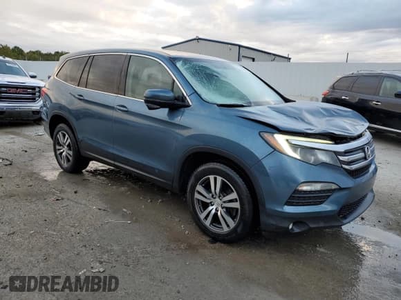 ✅ 2017 Honda Pilot EX-L • VIN: 5FNYF6H74HB027883 • Lot: 84881035. Listed on Copart with 194,864 mi. Free auction sales archive from the USA and detailed vehicle history report at DreamBid. Image 4.