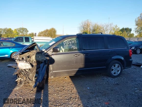 ✅ 2013 Dodge Grand Caravan Crew • VIN: 2C4RDGDGXDR781021 • Lot: 43489977. Wystawiony na IAAI z przebiegiem 116 534 mil. Bezpłatny archiwum sprzedaży aukcyjnych z USA i szczegółowy raport historii pojazdu na DreamBid. Zdjęcie 15.