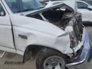 ✅ 1995 Ford F-150 • VIN: 1FTDF15Y2SLA09272 • Lot: 42292685. Listed on IAAI with 179,813 mi. Free auction sales archive from the USA and detailed vehicle history report at DreamBid. Image 13.