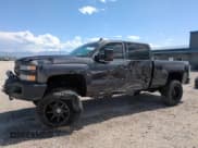 ✅ 2015 Chevrolet Silverado 3500HD LTZ • VIN: 1GC4K0C80FF617109 • Lot: 67799675. Listed on Copart with 152,423 mi. Free auction sales archive from the USA and detailed vehicle history report at DreamBid. Image 1.