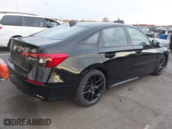 ✅ 2023 Honda Civic Sport • VIN: 2HGFE2F5XPH545950 • Lot: 43629692. Listed on IAAI with 35,089 mi. Free auction sales archive from the USA and detailed vehicle history report at DreamBid. Image 4.