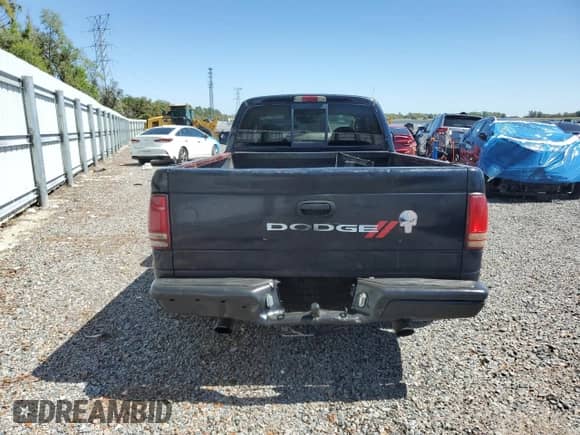 2004 Dodge Dakota Sport z VIN 1D7GL32K04S584048, wystawiony jako Copart lot #47600755 z przebiegiem 215 810 mil mil oraz Szkoda całkowita • Salvage title. Historia ofert i sprzedaży dostępna na DreamBid. Obrazek 6.