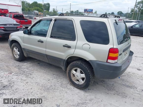 ✅ 2003 Ford Escape XLS Popular • VIN: 1FMYU92193KE08437 • Lot: 42858929. Listed on IAAI with 163,341 mi. Free auction sales archive from the USA and detailed vehicle history report at DreamBid. Image 3.