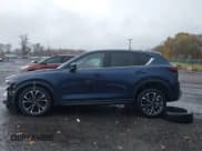 ✅ 2022 Mazda CX-5 S Premium • VIN: JM3KFBDM1N1548677 • Lot: 43567571. Wystawiony na IAAI z przebiegiem 44 177 mil. Bezpłatny archiwum sprzedaży aukcyjnych z USA i szczegółowy raport historii pojazdu na DreamBid. Zdjęcie 15.