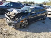 ✅ 2018 Honda Civic EX-L • VIN: JHMFC1F74JX014471 • Lot: 91617355. Wystawiony na Copart z przebiegiem 108 197 mil. Bezpłatny archiwum sprzedaży aukcyjnych z USA i szczegółowy raport historii pojazdu na DreamBid. Zdjęcie 1.