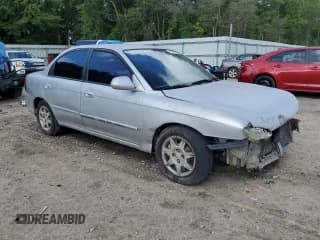 ✅ 2003 Kia Spectra • VIN: KNAFB121735286241 • Лот: 60834815. Опубликован ранее на Copart с пробегом 204 803 миль. Бесплатный доступ к архиву аукционных продаж из США и подробный отчёт об истории автомобиля на DreamBid. Изображение 4.