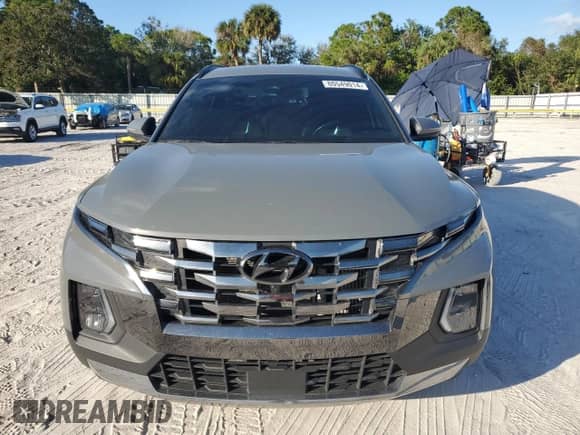 2023 Hyundai Santa Cruz Limited z VIN 5NTJEDAF5PH063657, wystawiony jako Copart lot #80549014 z przebiegiem 65 303 mil mil oraz Szkoda całkowita • Salvage title. Historia ofert i sprzedaży dostępna na DreamBid. Obrazek 5.