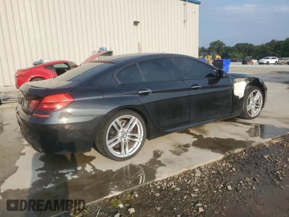 ✅ 2014 BMW 6 Series 650i • VIN: WBA6B2C53ED129712 • Лот: 81146305. Опубликован ранее на Copart с пробегом 94 865 миль. Бесплатный доступ к архиву аукционных продаж из США и подробный отчёт об истории автомобиля на DreamBid. Изображение 3.