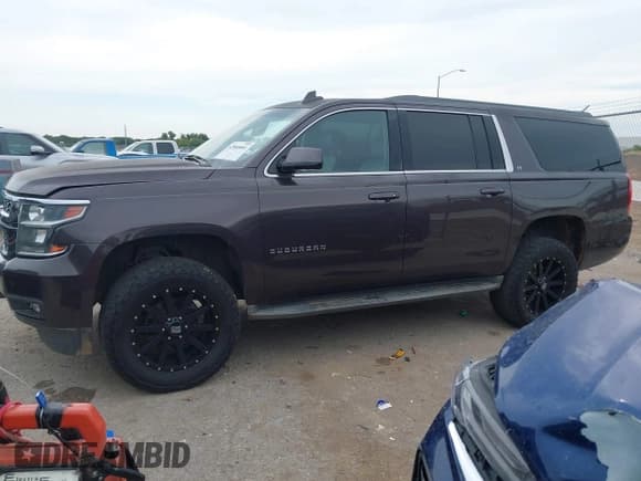 ✅ 2016 Chevrolet Suburban LT • VIN: 1GNSCHKC4GR169778 • Lot: 42960681. Listed on IAAI with 153,194 mi. Free auction sales archive from the USA and detailed vehicle history report at DreamBid. Image 2.