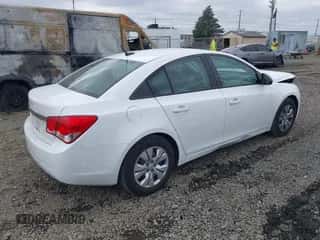 2014 Chevrolet Cruze LS z VIN 1G1PA5SG2E7340003, wystawiony jako IAAI lot #43199350 z przebiegiem 123 646 mil mil oraz . Historia ofert i sprzedaży dostępna na DreamBid. Obrazek 4.