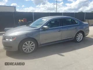 ✅ 2013 Volkswagen Passat SEL • VIN: 1VWCP7A30DC131781 • Lot: 84622315. Listed on Copart with 111,343 mi. Free auction sales archive from the USA and detailed vehicle history report at DreamBid. Image 1.