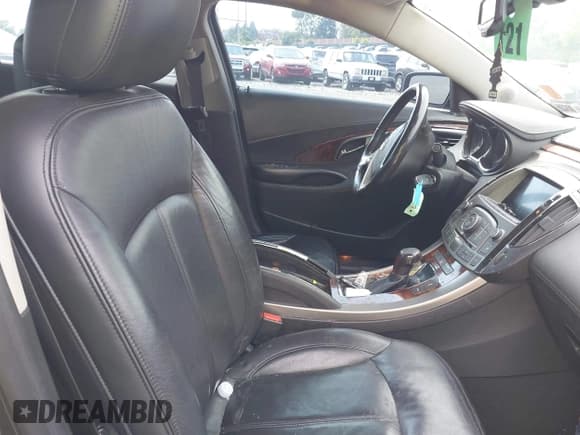 ✅ 2013 Buick LaCrosse Leather • VIN: 1G4GC5E38DF120956 • Lot: 42510324. Listed on IAAI with 127,260 mi. Free auction sales archive from the USA and detailed vehicle history report at DreamBid. Image 5.