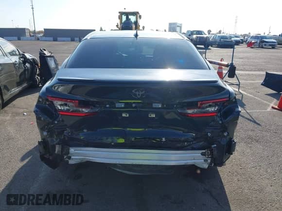 2025 Toyota Camry LE z VIN 4T1DAACK5SU551419, wystawiony jako IAAI lot #43243364 z przebiegiem 4 879 mil mil oraz . Historia ofert i sprzedaży dostępna na DreamBid. Obrazek 6.