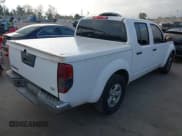 ✅ 2012 Nissan Frontier SV • VIN: 1N6AD0ER9CC425037 • Lot: 43204852. Listed on IAAI with 157,205 mi. Free auction sales archive from the USA and detailed vehicle history report at DreamBid. Image 4.