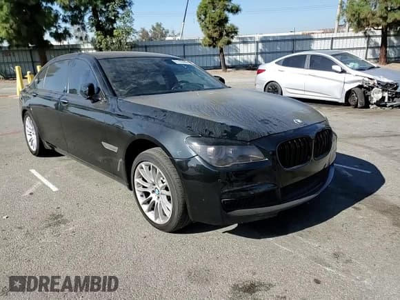 ✅ 2012 BMW 7 Series 750Li • VIN: WBAKB8C52CDX20760 • Lot: 91109405. Listed on Copart with 124,600 mi. Free auction sales archive from the USA and detailed vehicle history report at DreamBid. Image 14.
