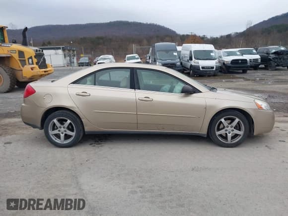 ✅ 2006 Pontiac G6 6-Cyl • VIN: 1G2ZG558X64249877 • Lot: 43730025. Listed on IAAI with 96,303 mi. Free auction sales archive from the USA and detailed vehicle history report at DreamBid. Image 13.