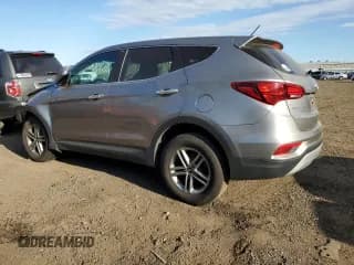 ✅ 2018 Hyundai Santa Fe 2.4L • VIN: 5XYZTDLB3JG568466 • Лот: 47022913. Опубликован ранее на Copart с пробегом 90 589 миль. Бесплатный доступ к архиву аукционных продаж из США и подробный отчёт об истории автомобиля на DreamBid. Изображение 2.