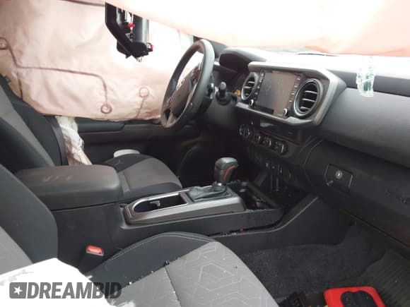 ✅ 2023 Toyota Tacoma SR • VIN: 3TMCZ5AN9PM636854 • Lot: 43298762. Listed on IAAI with 22,831 mi. Free auction sales archive from the USA and detailed vehicle history report at DreamBid. Image 5.