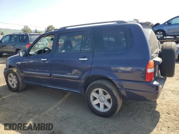 ✅ 2003 Suzuki XL7 Touring • VIN: JS3TX92V334111274 • Lot: 48803325. Listed on Copart with 153,714 mi. Free auction sales archive from the USA and detailed vehicle history report at DreamBid. Image 2.