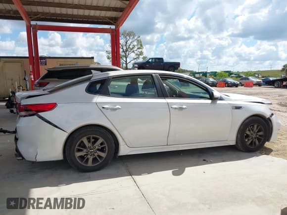 ✅ 2016 Kia Optima LX Turbo • VIN: 5XXGT4L14GG079649 • Lot: 43510554. Listed on IAAI with 157,300 mi. Free auction sales archive from the USA and detailed vehicle history report at DreamBid. Image 14.