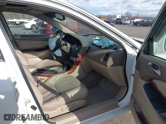 ✅ 2002 Acura TL • VIN: 19UUA566X2A057716 • Лот: 43713410. Опубликован ранее на IAAI с пробегом 104 579 миль. Бесплатный доступ к архиву аукционных продаж из США и подробный отчёт об истории автомобиля на DreamBid. Изображение 5.