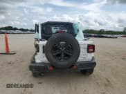 ✅ 2020 Jeep Wrangler Unlimited Sahara Altitude • VIN: 1C4HJXEN3LW162848 • Лот: 65244345. Опубликован ранее на Copart с пробегом Не указан. Бесплатный доступ к архиву аукционных продаж из США и подробный отчёт об истории автомобиля на DreamBid. Изображение 6.