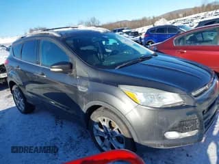 ✅ 2015 Ford Escape Titanium • VIN: 1FMCU9JX5FUA98277 • Lot: 43890711. Listed on IAAI with 156,680 mi. Free auction sales archive from the USA and detailed vehicle history report at DreamBid. Image 1.