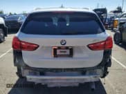✅ 2018 BMW X1 sDrive28i • VIN: WBXHU7C36J5H39633 • Лот: 86855225. Опубликован ранее на Copart с пробегом 70 863 миль. Бесплатный доступ к архиву аукционных продаж из США и подробный отчёт об истории автомобиля на DreamBid. Изображение 6.
