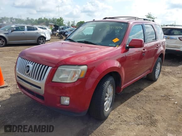 ✅ 2011 Mercury Mariner Premier • VIN: 4M2CN8HG1BKJ06957 • Lot: 42455616. Listed on IAAI with 206,388 mi. Free auction sales archive from the USA and detailed vehicle history report at DreamBid. Image 2.