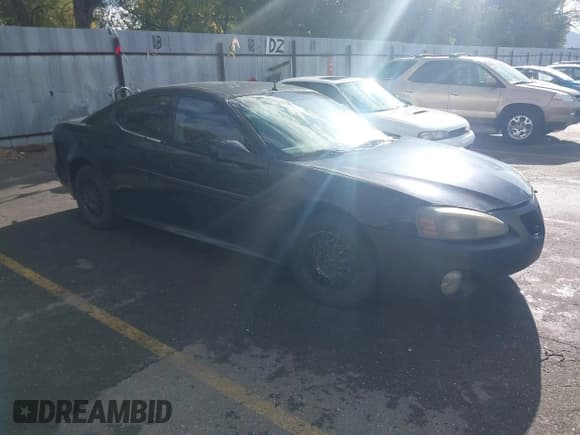 ✅ 2005 Pontiac Grand Prix • VIN: 2G2WP522251184309 • Lot: 43450979. Listed on IAAI with 210,851 mi. Free auction sales archive from the USA and detailed vehicle history report at DreamBid. Image 1.