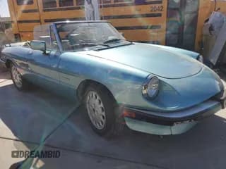 ✅ 1989 Alfa Romeo Spider • VIN: ZARBA5587K1066209 • Lot: 77166704. Listed on Copart with 98,255 mi. Free auction sales archive from the USA and detailed vehicle history report at DreamBid. Image 1.