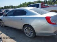 ✅ 2015 Lincoln MKS • VIN: 1LNHL9DK8FG608211 • Lot: 43154019. Listed on IAAI with 152,341 mi. Free auction sales archive from the USA and detailed vehicle history report at DreamBid. Image 15.