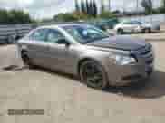 2011 Chevrolet Malibu 1LS z VIN 1G1ZB5E17BF171739, wystawiony jako Copart lot #63230574 z przebiegiem 153 931 mil mil oraz Szkoda całkowita • Salvage title. Historia ofert i sprzedaży dostępna na DreamBid. Obrazek 4.