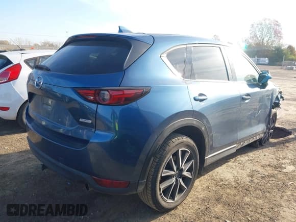 ✅ 2018 Mazda CX-5 Grand Touring • VIN: JM3KFBDM6J0419575 • Lot: 43517297. Listed on IAAI with Not provided. Free auction sales archive from the USA and detailed vehicle history report at DreamBid. Image 4.