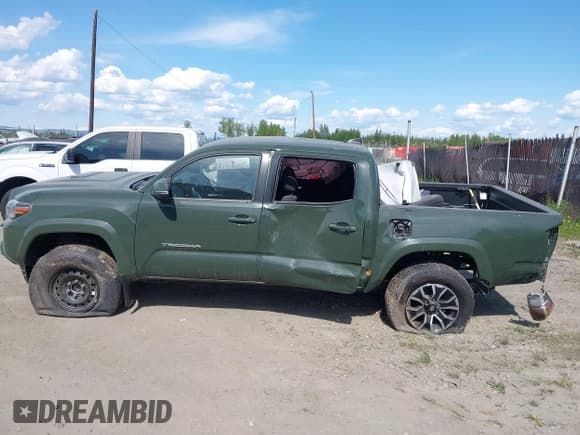 ✅ 2022 Toyota Tacoma SR • VIN: 3TMCZ5AN7NM472484 • Лот: 42505944. Опубликован ранее на IAAI с пробегом 59 131 миль. Бесплатный доступ к архиву аукционных продаж из США и подробный отчёт об истории автомобиля на DreamBid. Изображение 14.