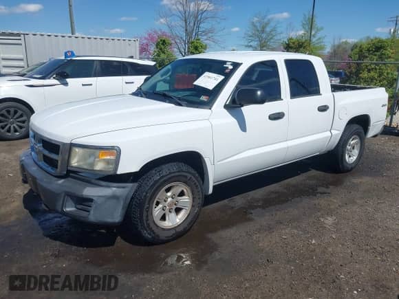 2008 Dodge Dakota z VIN 1D3HW38N38S581620, wystawiony jako IAAI lot #41961741 z przebiegiem 133 760 mil mil oraz . Historia ofert i sprzedaży dostępna na DreamBid. Obrazek 17.