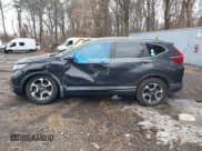 ✅ 2019 Honda CR-V Touring • VIN: 2HKRW2H99KH602129 • Lot: 43855817. Listed on IAAI with 91,135 mi. Free auction sales archive from the USA and detailed vehicle history report at DreamBid. Image 14.