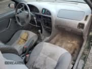 ✅ 1999 Chevrolet Metro • VIN: 2C1MR2268X6701369 • Лот: 84494354. Опубликован ранее на Copart с пробегом 156 275 миль. Бесплатный доступ к архиву аукционных продаж из США и подробный отчёт об истории автомобиля на DreamBid. Изображение 8.