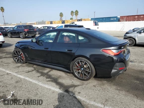 ✅ 2023 BMW i4 eDrive40 • VIN: WBY73AW0XPFN83377 • Lot: 82777005. Listed on Copart with 16,410 mi. Free auction sales archive from the USA and detailed vehicle history report at DreamBid. Image 2.