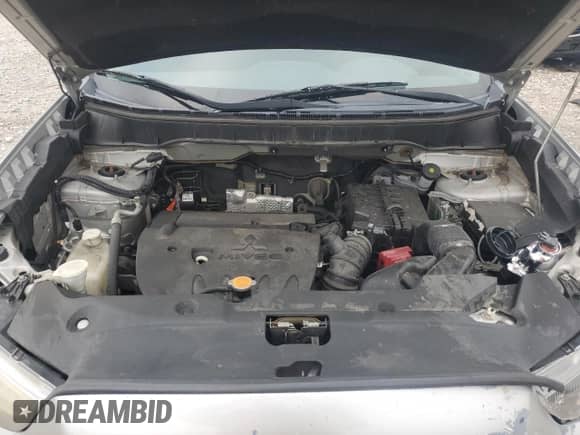 2013 Mitsubishi Outlander ES z VIN 4A4AP3AU7DE003014, wystawiony jako Copart lot #69355425 z przebiegiem 168 413 mil mil oraz Czysty tytuł • Clean title. Historia ofert i sprzedaży dostępna na DreamBid. Obrazek 12.